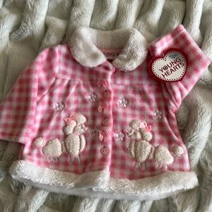 Baby girls faux fur pink checked jacket with poodles